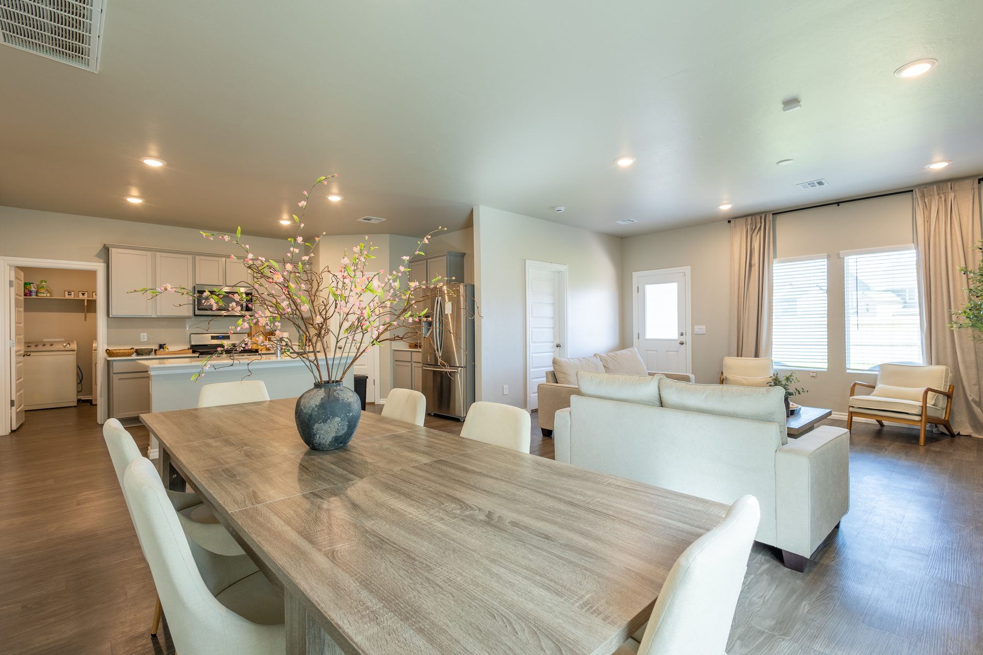 Bright open-concept living, dining, and kitchen space at Mongou Vacation Home